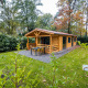 Wellness lodge in Buitencentrum Hessenheem in Nederland, knusse houten chalet in groene, rustige omgeving.