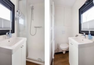 Bagno moderno sulla houseboat Aqua Dolce in Friesland, Paesi Bassi, con doccia, lavabo e toilette.