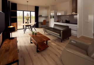 Wheelchair-friendly Holiday Villa Amalia 2 at Hofparken Wiltershaar, modern living room in nature.