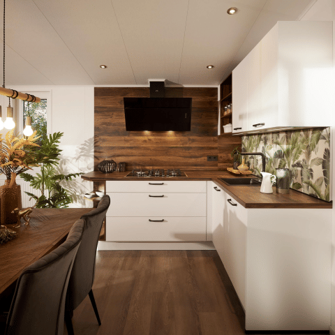 Interno cucina moderna nella Cubus Lodge al Bospark Markelo, Paesi Bassi, con accenti di legno e bianco.