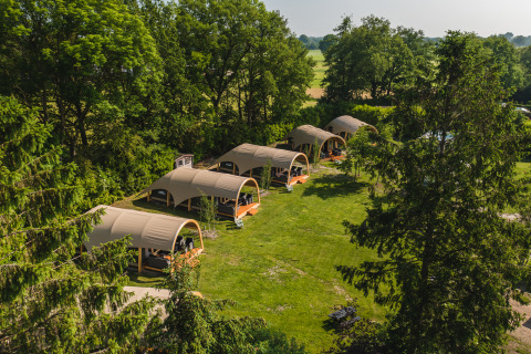 Aerial view of Safari Tent Lodge XL with private sanitary facilities at Holiday Resort 't Schuttenbelt, Netherlands.