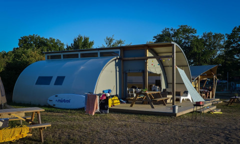 Panorama Lodge with bathroom at Holiday Park Mölke in the Netherlands, modern glamping accommodation.