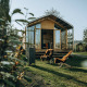 Billede af Wikkelhouse Bear, et naturhus ved Holiday park De Klepperstee i Holland med udendørs stole.