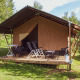 Safari tent at Recreation park and Marina Rhederlaagse Meren, Netherlands, with deck and outdoor chairs.