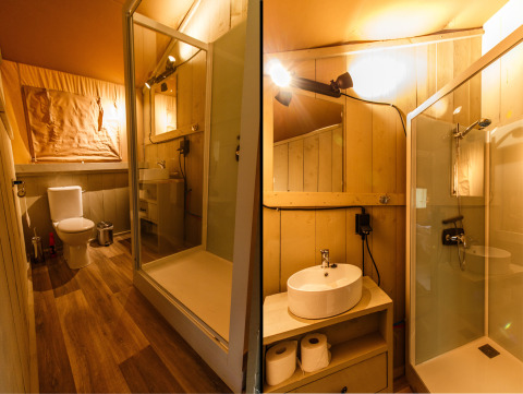 Interior view of the bathroom in a safari tent at Recreation park and Marina Rhederlaagse Meren, Netherlands.