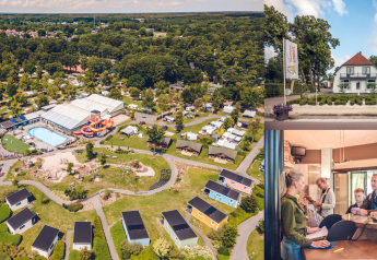 Luchtfoto van een glampingresort met kleurrijke huisjes, zwembad, receptie en gasten bij het inchecken.