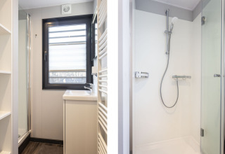 Modern bathroom on a houseboat in Offingawier with shower, sink, open shelving and large window.
