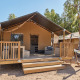 Glamping accommodation at Villatent Outback featuring a wooden deck, outdoor furniture, and hammock.